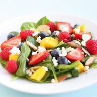 spinach salad with fruit, almonds, and feta cheese