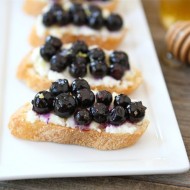 Roasted Blueberry Ricotta Crostini | www.twopeasandtheirpod.com