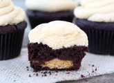 Chocolate Peanut Butter Cup Cupcakes from www.twopeasandtheirpod.com #recipe #cupcakes