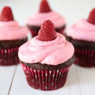 Dark Chocolate Cupcakes with Raspberry Buttercream Frosting from Two Peas and Their Pod (www.twopeasandtheirpod.com) #recipe #cupcakes