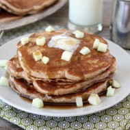 Whole Wheat Apple Cinnamon Pancakes from www.twopeasandtheirpod.com #recipe #pancakes