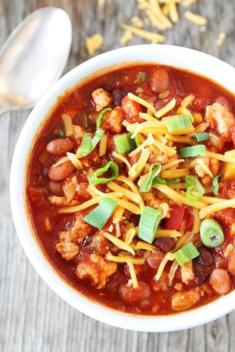 Slow Cooker Turkey Chili Recipe on twopeasandtheirpod.com Add the ingredients to the slow cooker and let it do the work!