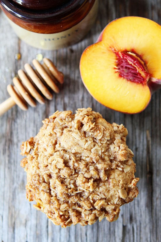Honey Peach Muffins with Oat Streusel Topping Recipe on twopeasandtheirpod.com Our family loves these muffins and they are easy to make too!