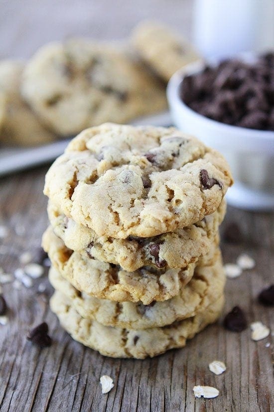 Oatmeal Chocolate Chip Cookie Recipe on twopeasandtheirpod.com The BEST cookie recipe! We make these all of the time! #cookies Stack of Oatmeal Chocolate Chip Cookies