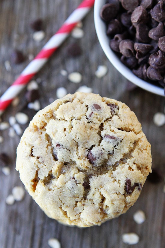 Oatmeal Chocolate Chip Cookie Recipe on twopeasandtheirpod.com The BEST cookie recipe! You can't go wrong with a classic! #cookies Best Oatmeal Chocolate Chip Cookies on Table