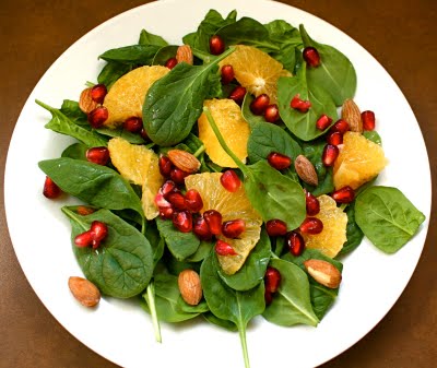 Spinach Salad with Oranges, Pomegranate, and Almonds Image