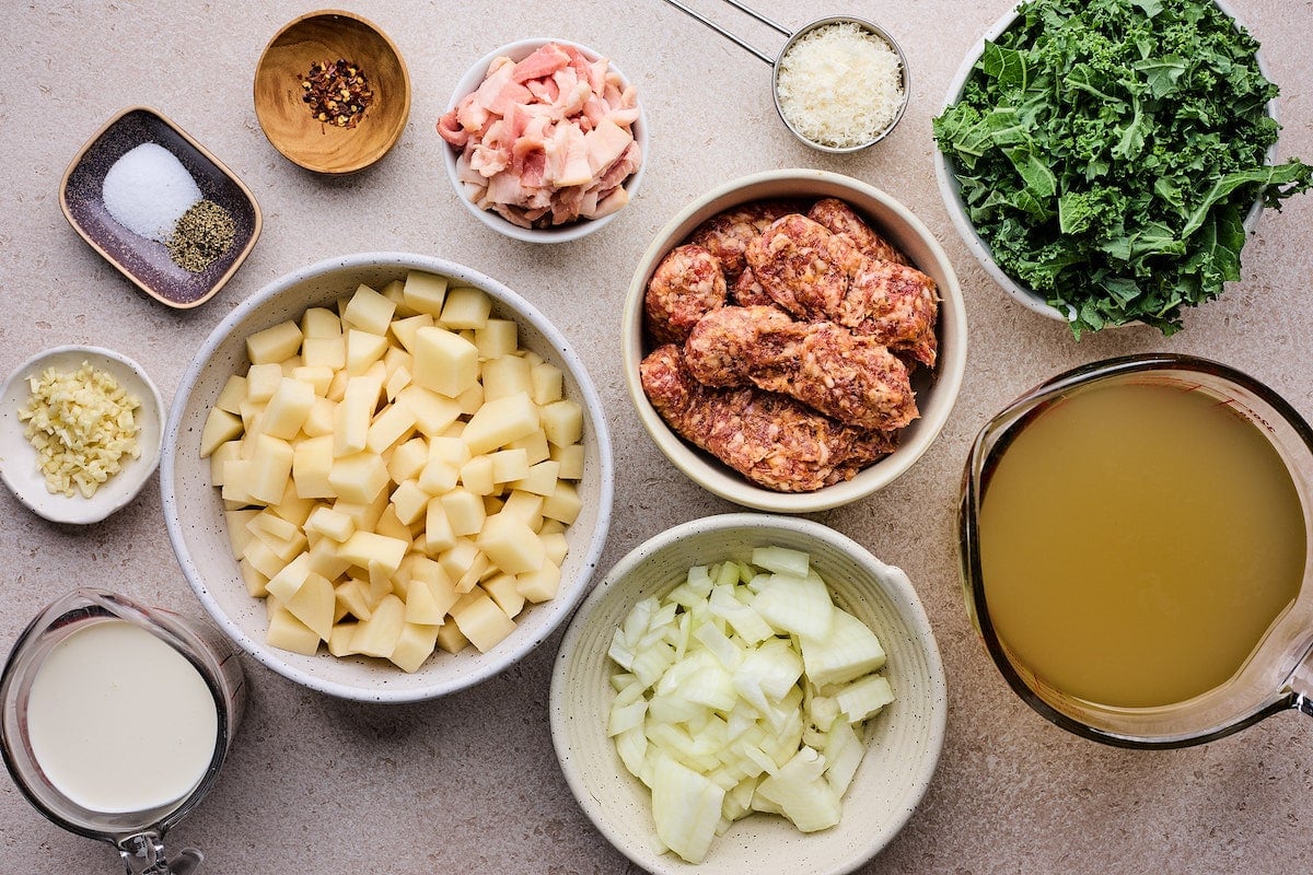 zuppa toscana ingredients in bowls. 