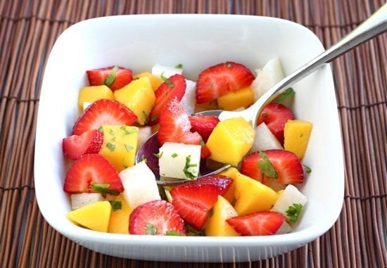 Strawberry Mango Salad Recipe on twopeasandtheirpod.com This simple and healthy salad is perfect for summertime!