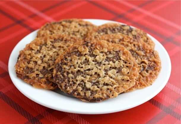 Lace Cookie Recipe are the perfect Christmas cookie! Everyone loves these thin and crispy oatmeal cookies that are filled with chocolate!