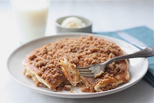 bite of cinnamon pancakes with streusel on top