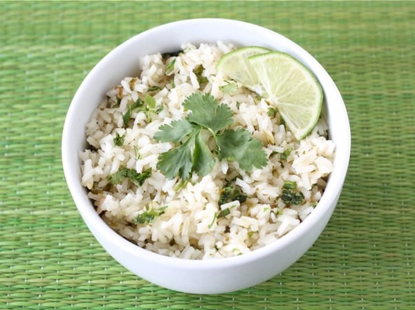 cilantro lime rice with lime and parsley on top