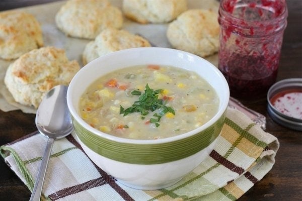 corn chowder soup served with biscuits