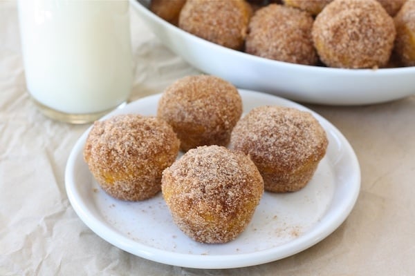 Easy Baked Pumpkin Donut Hole Recipe on twopeasandtheirpod.com We make these every fall!