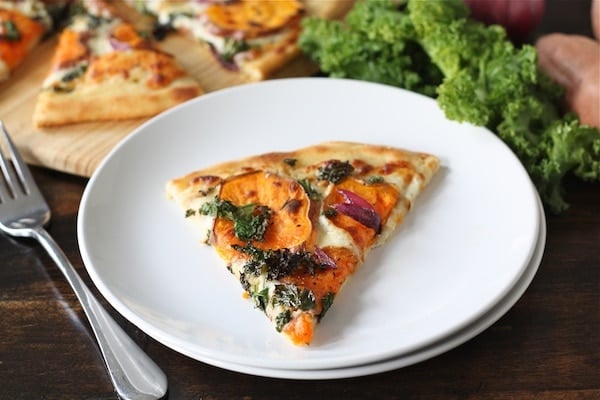 Sweet Potato Kale Pizza Recipe on twopeasandtheirpod.com #recipe 