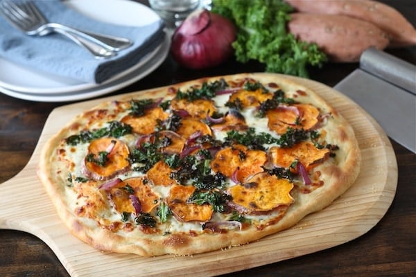 Sweet Potato Kale Pizza Recipe on twopeasandtheirpod.com #recipe #pizza