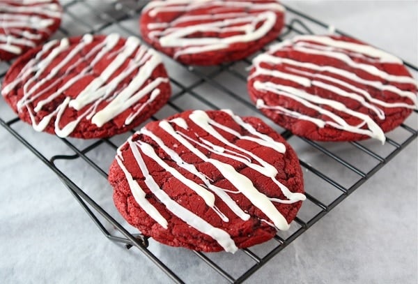 red velvet cheesecake cookies on cooling rack