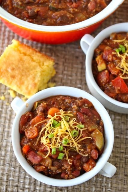 vegetarian chili served with cornbread and topped with cheese and onion