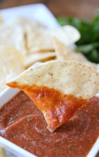 Chip dipped in Restaurant Style Salsa 