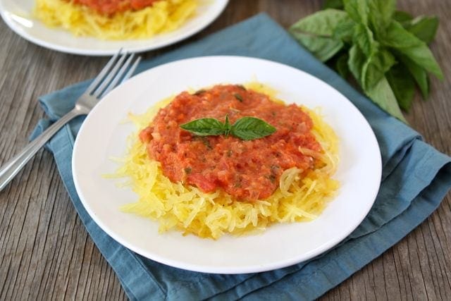 how to bake spaghetti squash and then top with roasted red pepper sauce