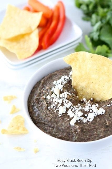 Easy Black Bean Dip recipe served with chips and veggies