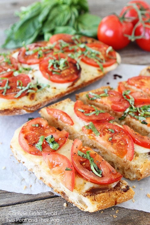 Caprese Garlic Bread is garlic bread with fresh mozzarella cheese, tomatoes, basil, and balsamic glaze. It is the best garlic bread recipe!