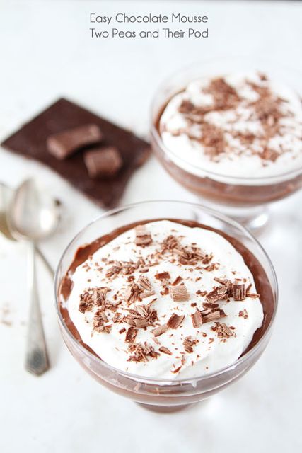 Chocolate Mouse in serving dish with whipped cream made from Easy Chocolate Mousse Recipe