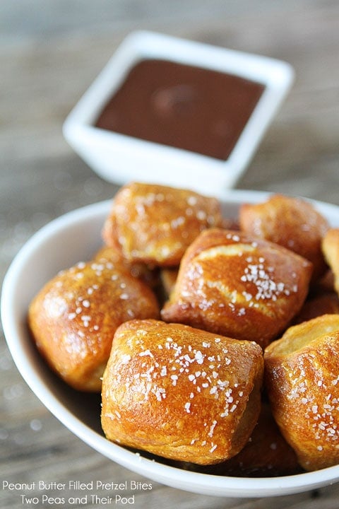 Homemade Pretzel Bites filled with peanut butter and dipped in chocolate-recipe on www.twopeasandtheirpod.com Peanut-Butter-Filled-Pretzel-Bites-2