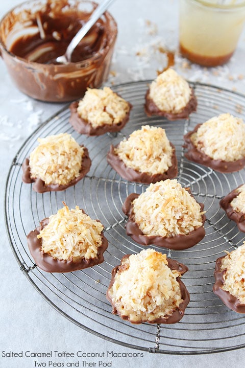 Salted Caramel Toffee Coconut Macaroons on twopeasandtheirpod.com They are dipped in chocolate too! The best coconut macaroons you will ever eat!