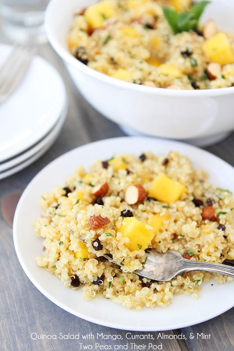 Quinoa Salad with Mango, Currants, Almonds, & Mint Recipe on twopeasandtheirpod.com This gluten-free and vegan salad is simple to make and so delicious! 