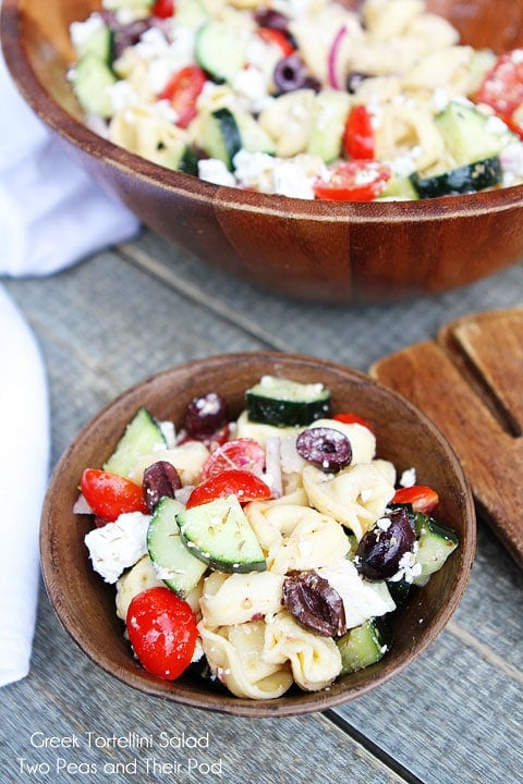 Greek Tortellini Salad served in wooden bowl