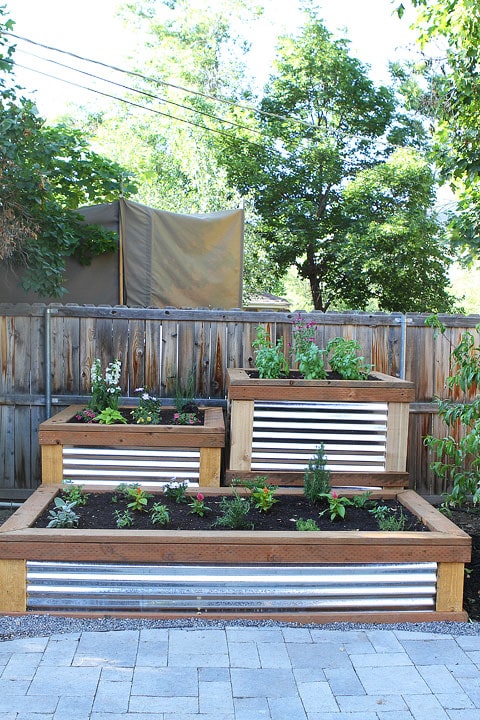 Build Your Own Raised Garden on twopeasandtheirpod.com
