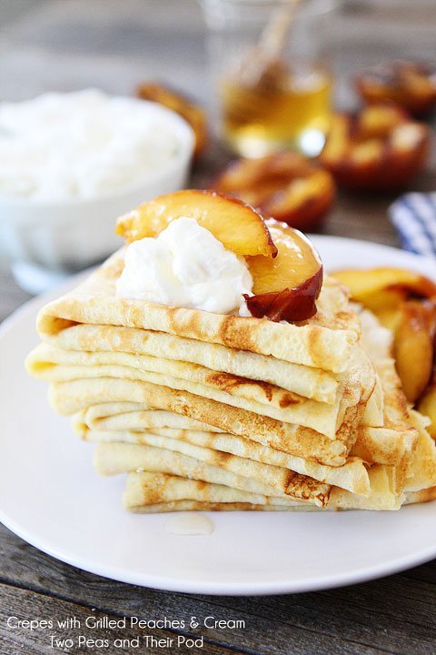 Crepes with Grilled Peaches & Cream Recipe on twopeasandtheirpod.com Great for dessert or breakfast!