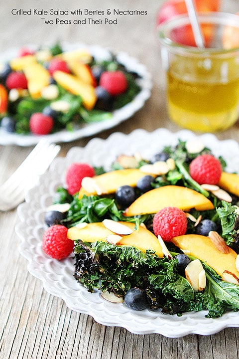 Grilled Kale Salad with Berries & Nectarines Recipe on twopeasandtheirpod.com Grilling kale makes this salad extra special! 