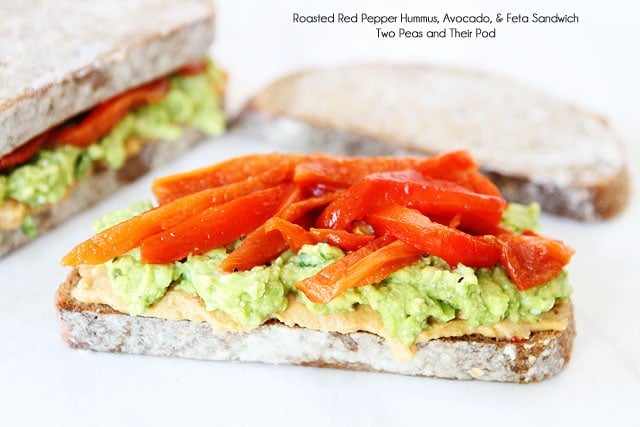 Roasted Red Pepper Hummus, Avocado, & Feta Sandwich Recipe on twopeasandtheirpod.com Love this sandwich! 