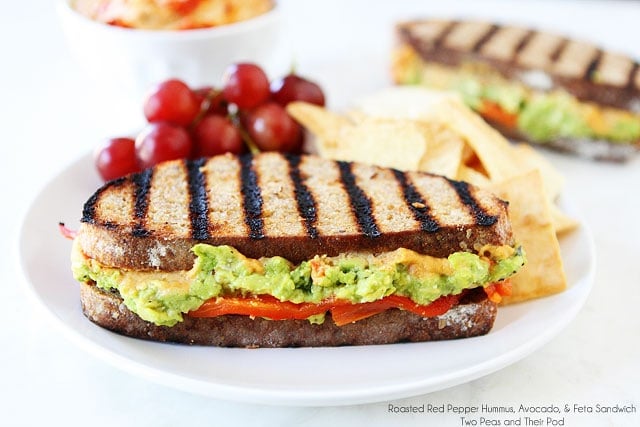Roasted Red Pepper Hummus, Avocado, & Feta Sandwich Recipe on twopeasandtheirpod.com Love this quick and easy sandwich! 