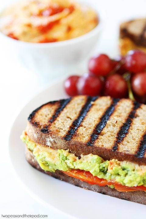 Roasted Red Pepper Hummus, Avocado, & Feta Sandwich Recipe on twopeasandtheirpod.com 