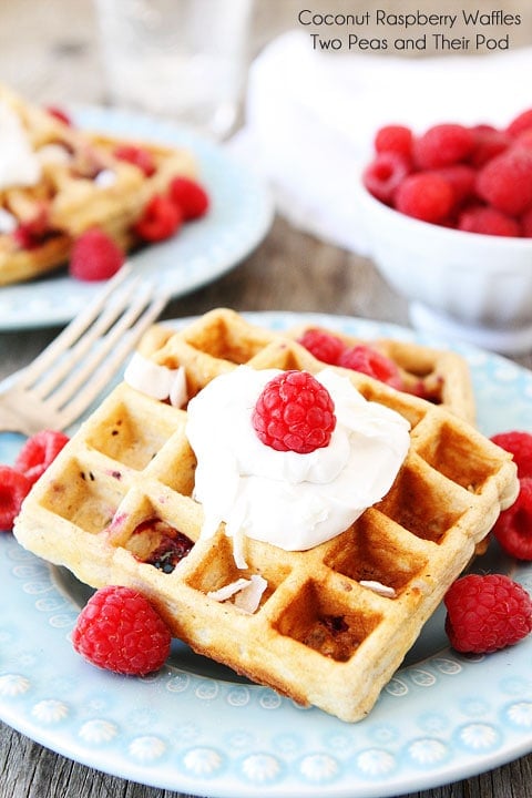 Coconut Raspberry Waffles with Coconut Whipped Cream Recipe on twopeasandtheirpod.com These waffles are amazing! 