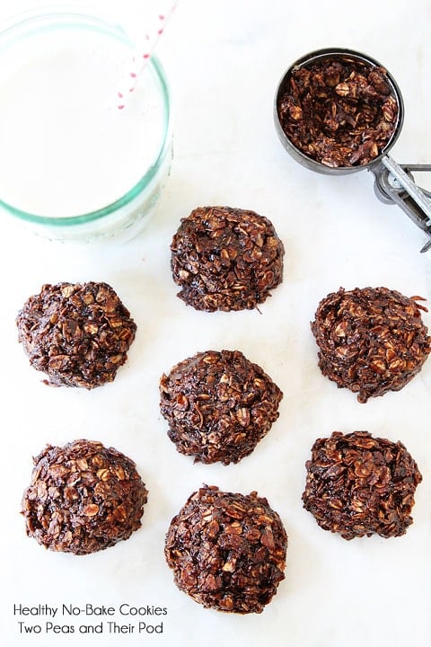 Healthy No Bake Cookies laid out to cool with glass of milk