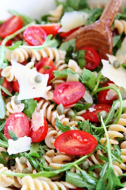 Simple Arugula Pasta Salad Recipe on twopeasandtheirpod.com