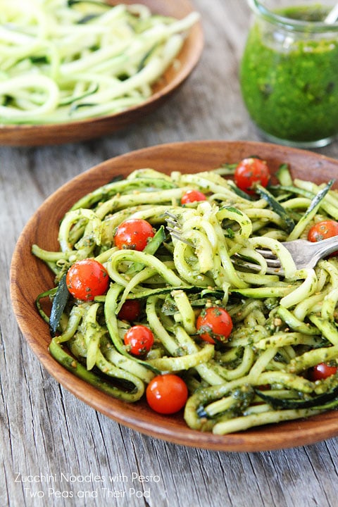 Zucchini Pasta tossed with Pesto in wood serving bowl