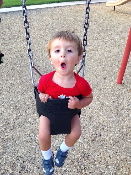 caleb-kisses-swinging