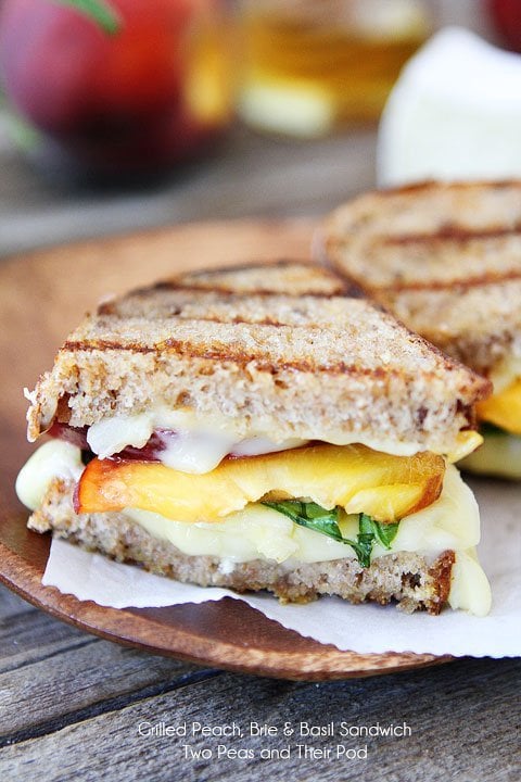 Grilled Peach, Brie, & Basil Sandwich Recipe on twopeasandtheirpod.com A simple summer sandwich with gourmet flavors!
