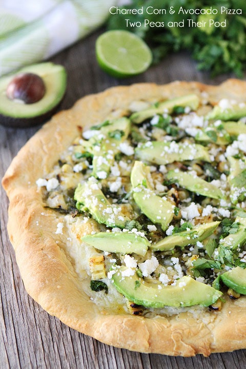 Charred Corn and Avocado Pizza Recipe on twopeasandtheirpod.com Come grab a slice!