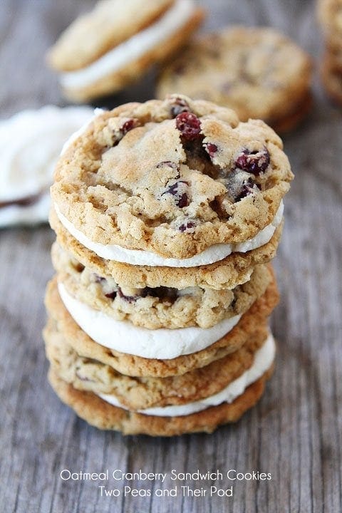 Oatmeal Cranberry Sandwich Cookies with White Chocolate Creme Filling on twopeasandtheirpod.com #recipe