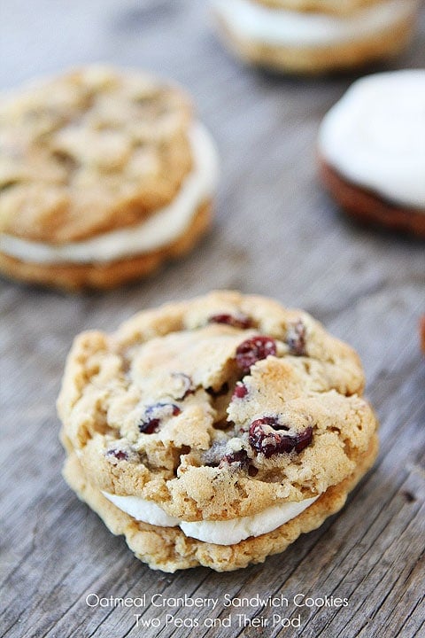 Oatmeal Cranberry Sandwich Cookies with White Chocolate Buttercream on twopeasandtheirpod.com The perfect holiday cookie!