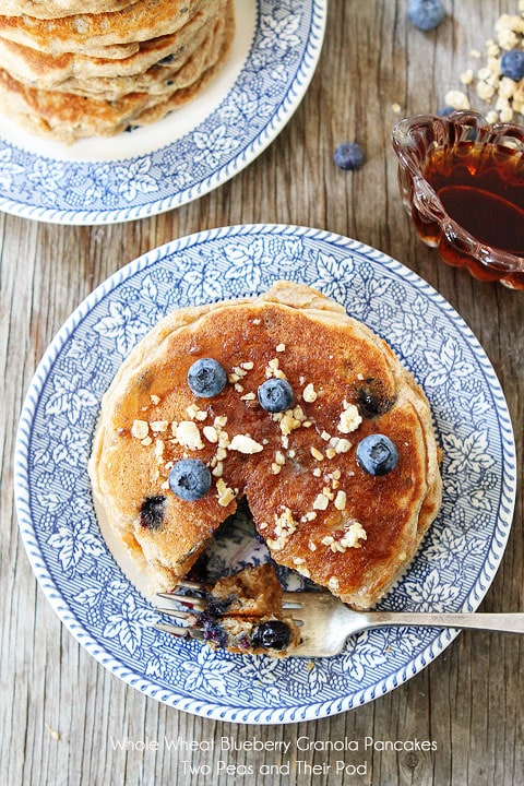 Whole Wheat Blueberry Granola Pancakes on twopeasandtheirpod.com #pancakes #recipe