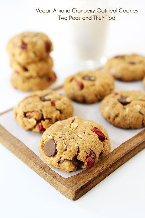 Recipe for Healthy Almond Cranberry Oatmeal Cookies on twopeasandtheirpod.com We LOVE these vegan cookies!