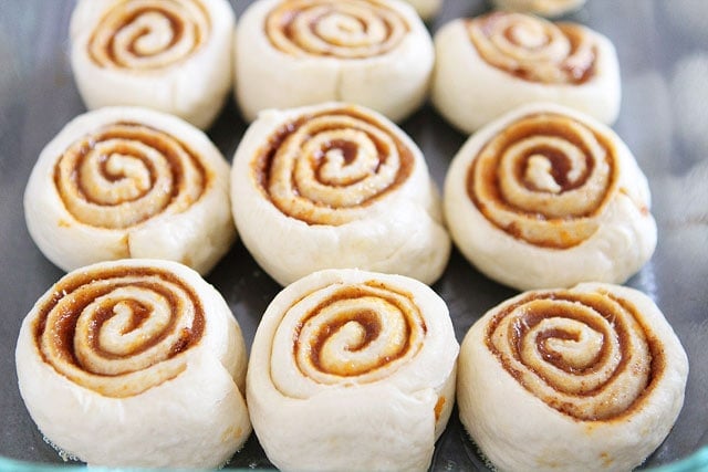 Recipe for Easy Mini Pumpkin Cinnamon Rolls on twopeasandtheirpod.com