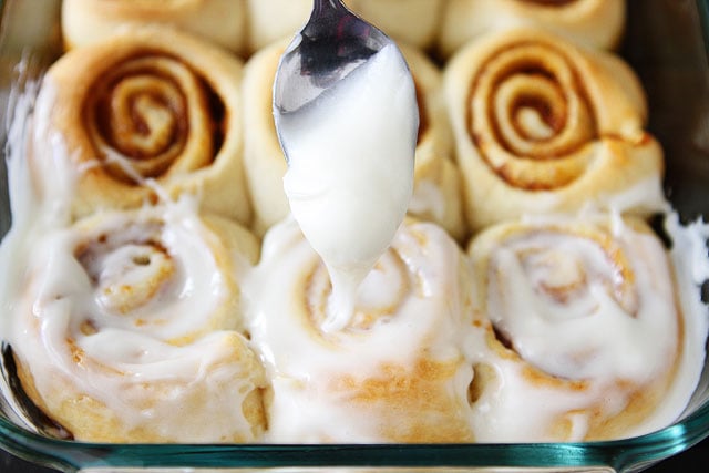 Recipe for Easy Mini Pumpkin Cinnamon Rolls on twopeasandtheirpod.com #recipe