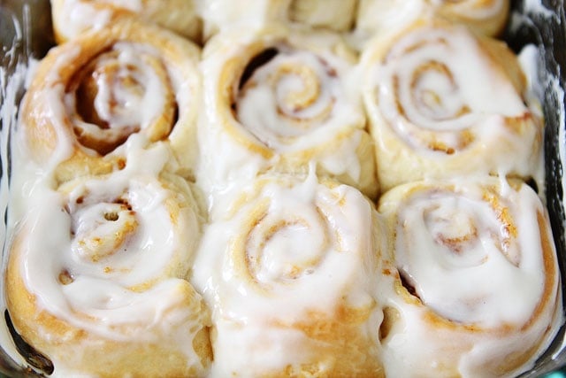 Recipe for Easy Mini Pumpkin Cinnamon Rolls with Cream Cheese Frosting on twopeasandtheirpod.com 